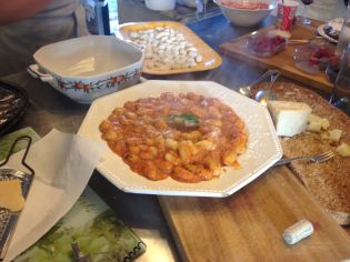 Gnocchi with tomato sauce. Veronica whipped up a second with butter and fresh sage from her garden.
